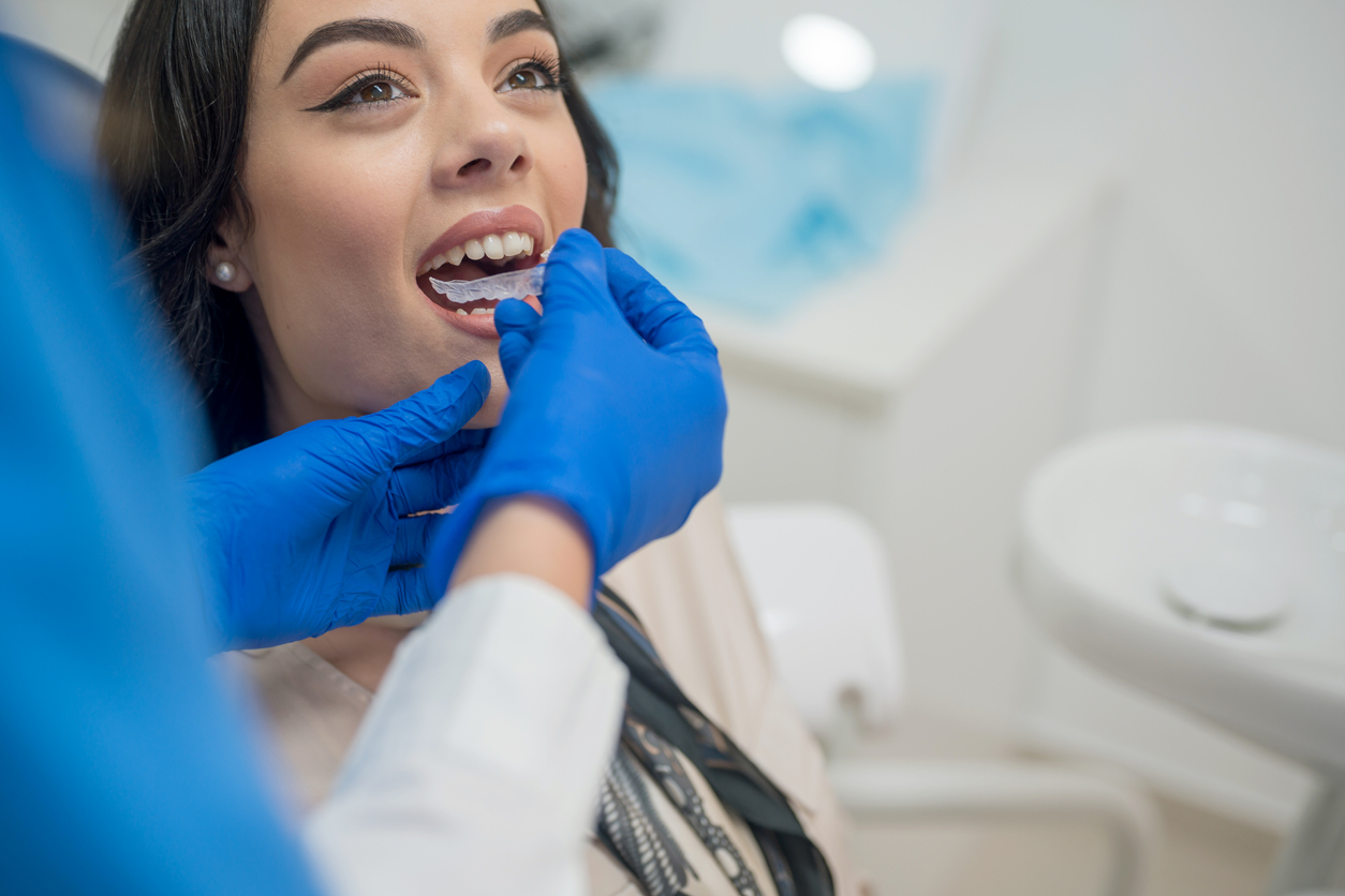 A Woman Receiving Invisalign Treatment